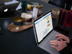 Social media work on laptop